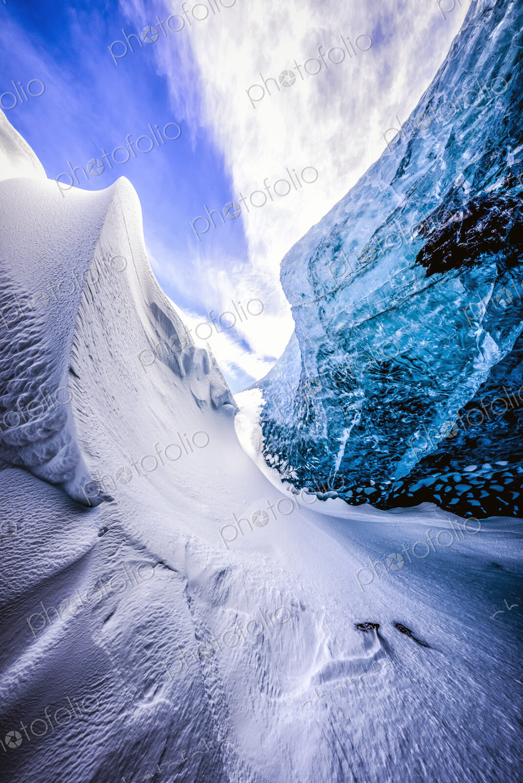 Glass wall of snowy ice cave