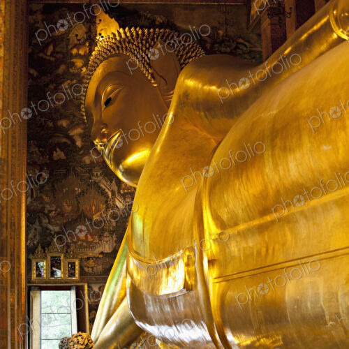 Gold statue of Buddha in temple, Bangkok, Thailand