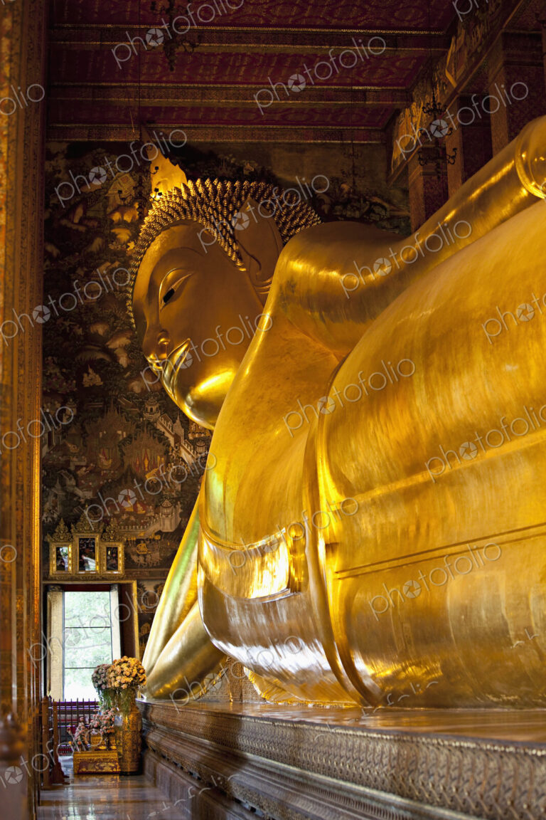 Gold statue of Buddha in temple, Bangkok, Thailand