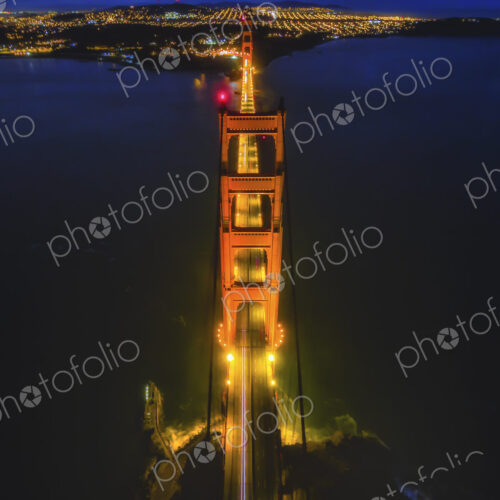 Golden Gate Bridge, aerial view at night. The still waters of San Francisco Bay. Golden Gate Bridge, aerial view at night. The still waters of San Francisco Bay.