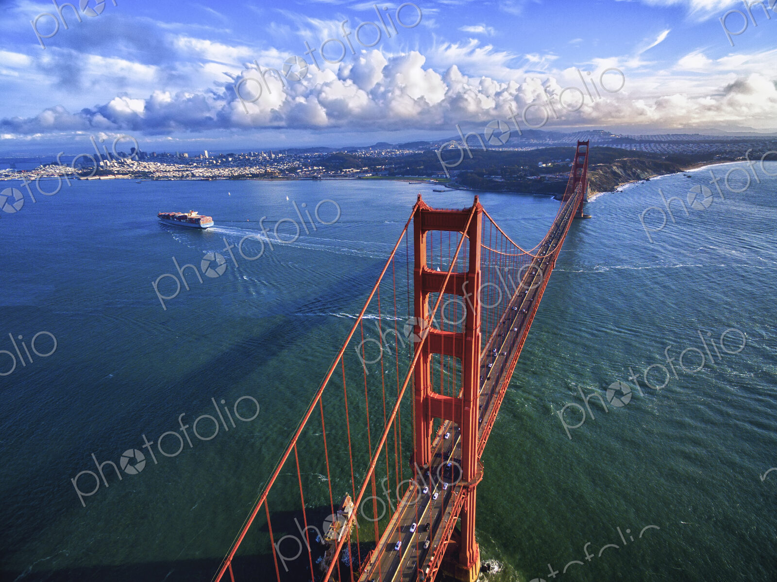 Golden Gate Bridge, aerial view of the large road bridge and the landscape around it,…