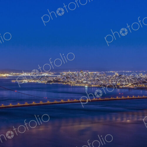 Golden Gate bridge across San Francisco bay at twilight.