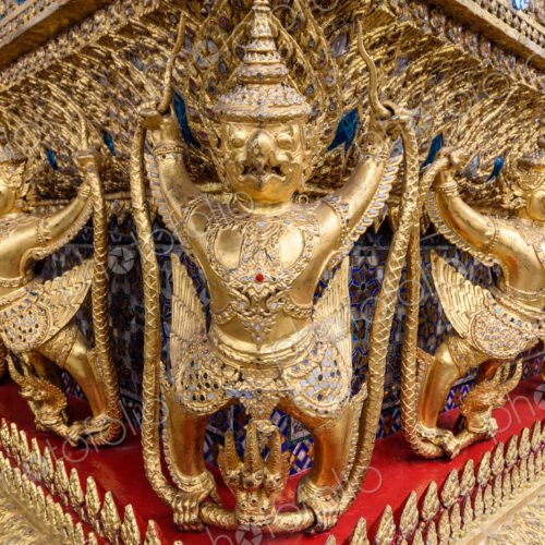 Golden decoration on the base of the main building of Wat Phra Kaew.