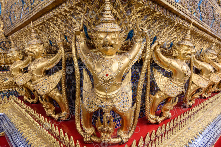 Golden decoration on the base of the main building of Wat Phra Kaew.