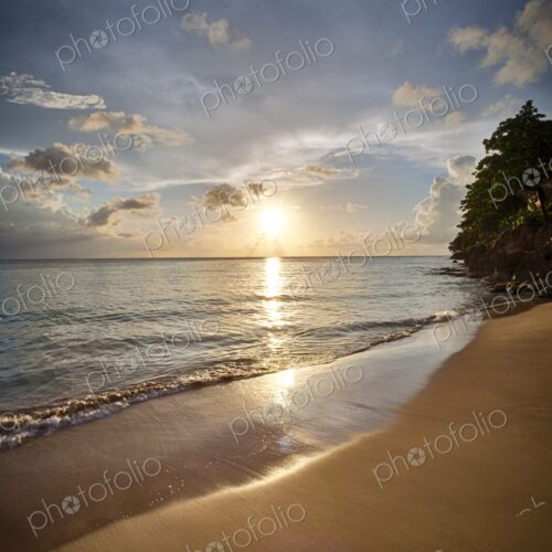 Golden light reflects on the smooth shoreline at Crash Boat Beach in Puerto Rico as… Golden light reflects on the smooth shoreline at Crash Boat Beach in Puerto Rico as…