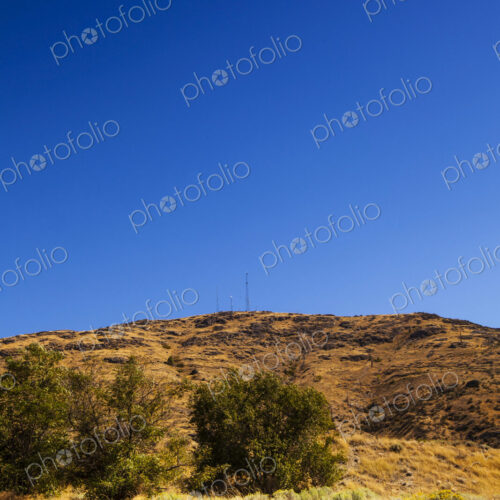 Grand Coulee Dam, Electric City, a view from a distance of the terrain around the dam,… Grand Coulee Dam, Electric City, a view from a distance of the terrain around the dam,…