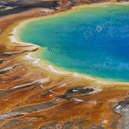 Grand Prismatic Spring, a bright turquoise pool and site of geothermal activity, with…