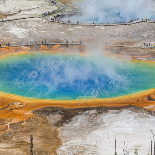 Grand Prismatic Spring, heated geothermal pool with mist rising Grand Prismatic Spring, heated geothermal pool with mist rising