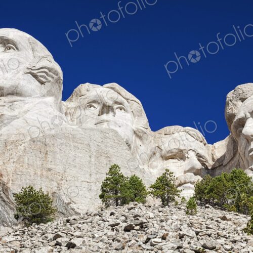 Granite carvings of Washington, Jefferson, Roosevelt, and Lincoln at Mount Rushmore…