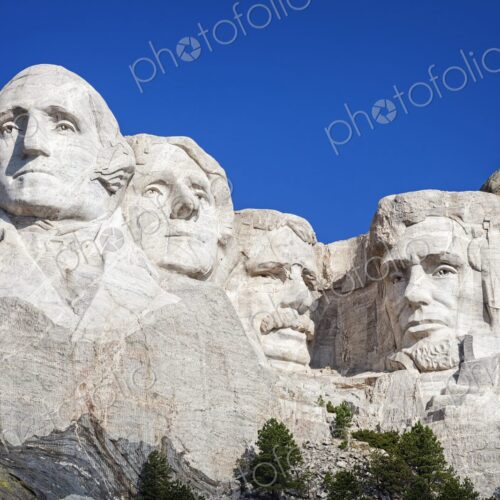 Granite carvings of Washington, Jefferson, Roosevelt, and Lincoln at Mount Rushmore…