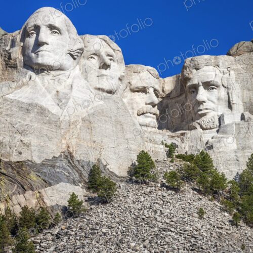 Granite carvings of Washington, Jefferson, Roosevelt, and Lincoln at Mount Rushmore…