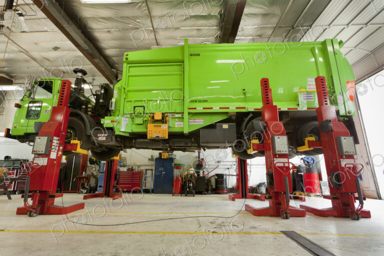 Green Garbage Truck Maintenance