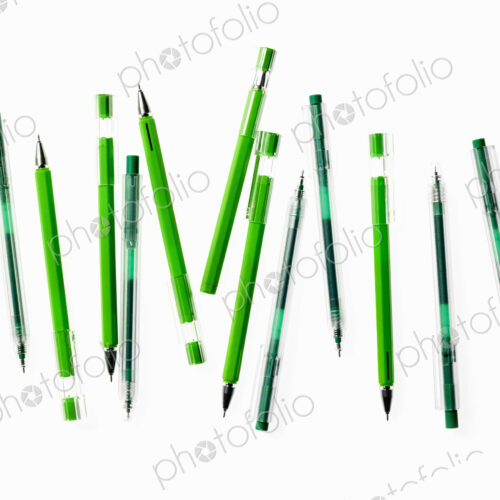 Green Office Supplies. A group of pens, blue and green colours. Green Office Supplies. A group of pens, blue and green colours.