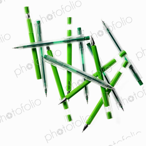 Green Office Supplies. A group of pens, blue and green colours. Green Office Supplies. A group of pens, blue and green colours.