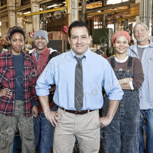 Group of workers, multi-ethnic group, manager and team in warehouse