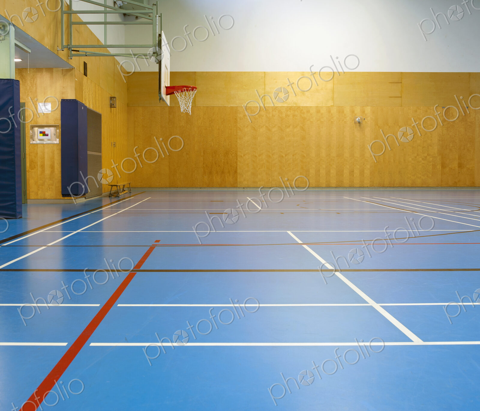 Gymnasium and basketball court, large empty gym.