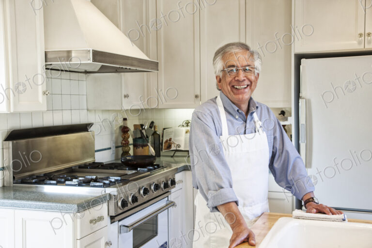 HIspanic senior man in his remodeled kitchen
