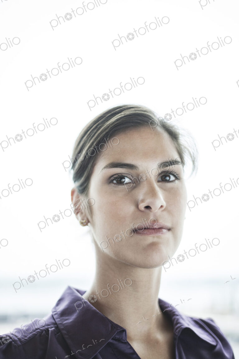 HIspanic woman in an office.