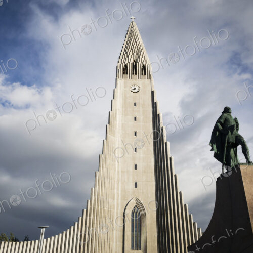 Hallgrímskirkja church, a tall modern church tower and statue of the explorer Leif… Hallgrímskirkja church, a tall modern church tower and statue of the explorer Leif…