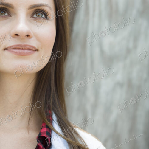 Head and shoulders portrait of a smiling woman. Head and shoulders portrait of a smiling woman.