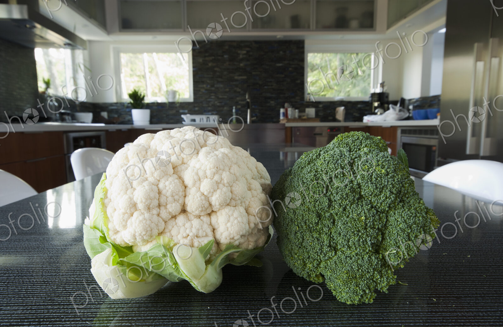 Head of Broccoli and Cauliflower on a Table