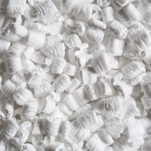 Heap of packaging shapes, white polystyrene material.