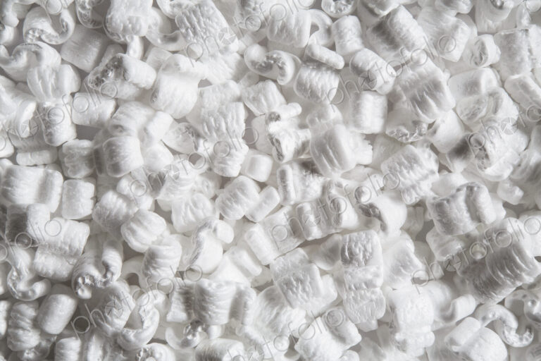 Heap of packaging shapes, white polystyrene material.