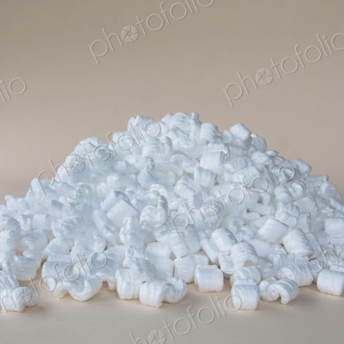 Heap of packaging shapes, white polystyrene material.