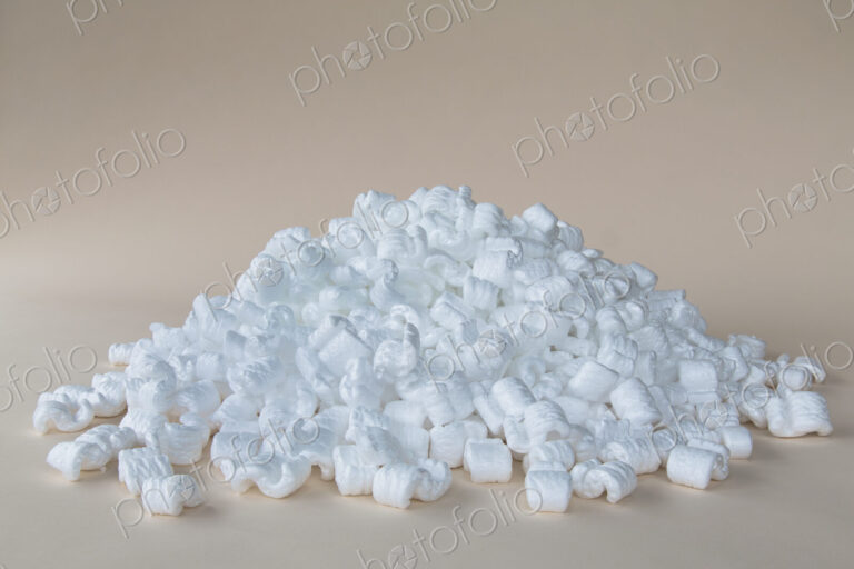 Heap of packaging shapes, white polystyrene material.