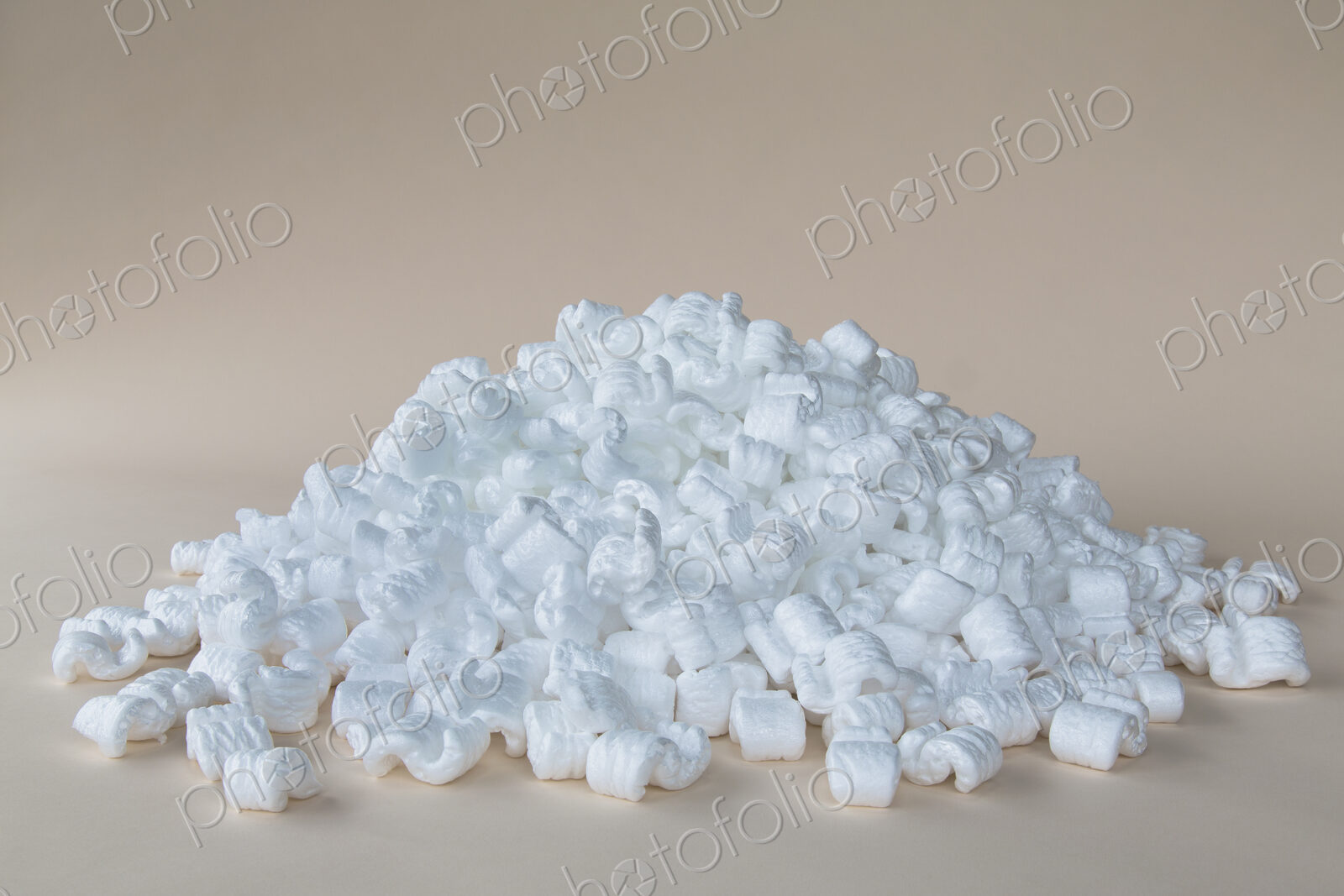 Heap of packaging shapes, white polystyrene material.