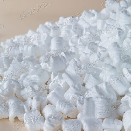 Heap of packaging shapes, white polystyrene material.