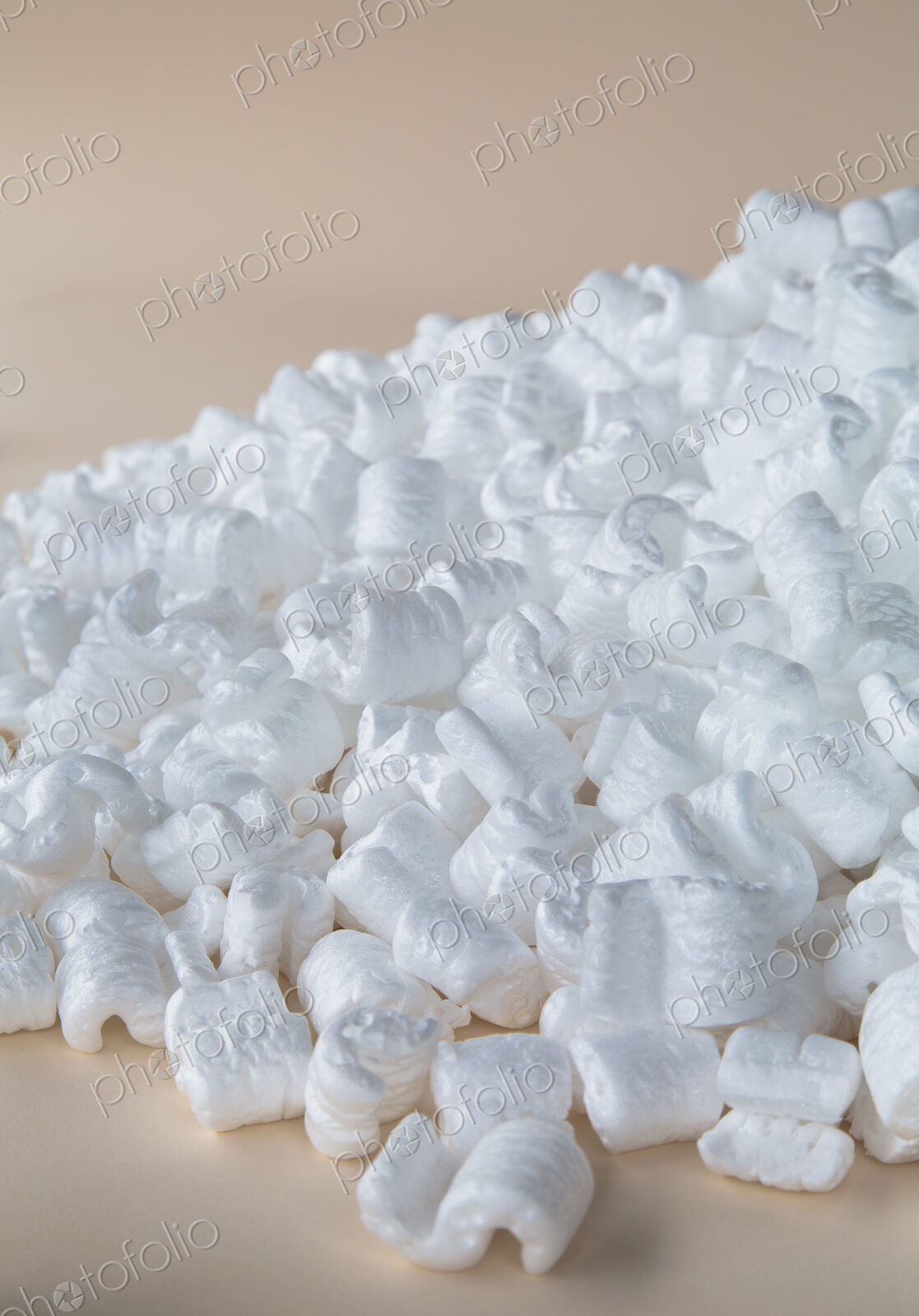 Heap of packaging shapes, white polystyrene material.