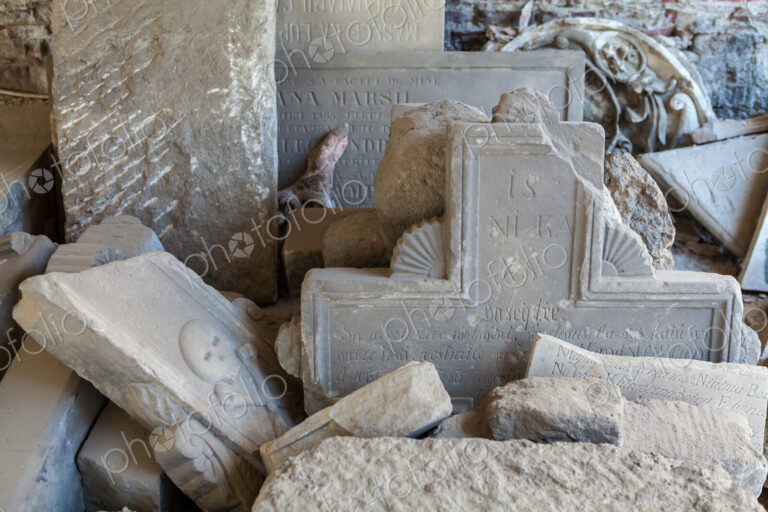 Heaps of stones with inscriptions in Pelus Castle, broken gravestones and carved bas…
