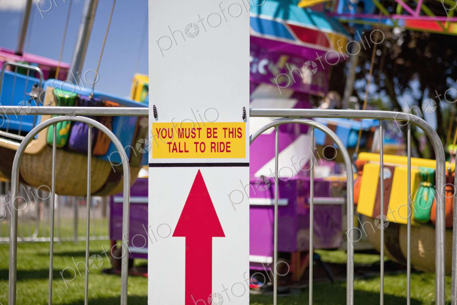 Height Requirment Sign In Front Of Amusement Park Ride
