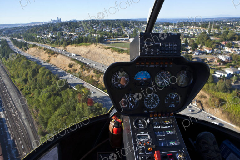 Helicopter In Flight Over Freeway