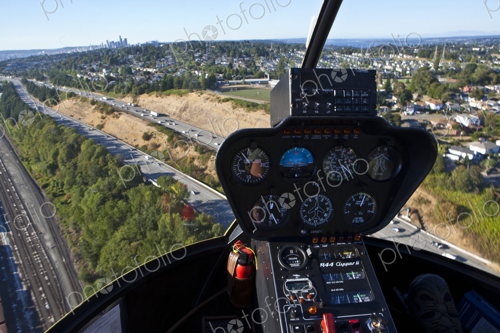 Helicopter In Flight Over Freeway