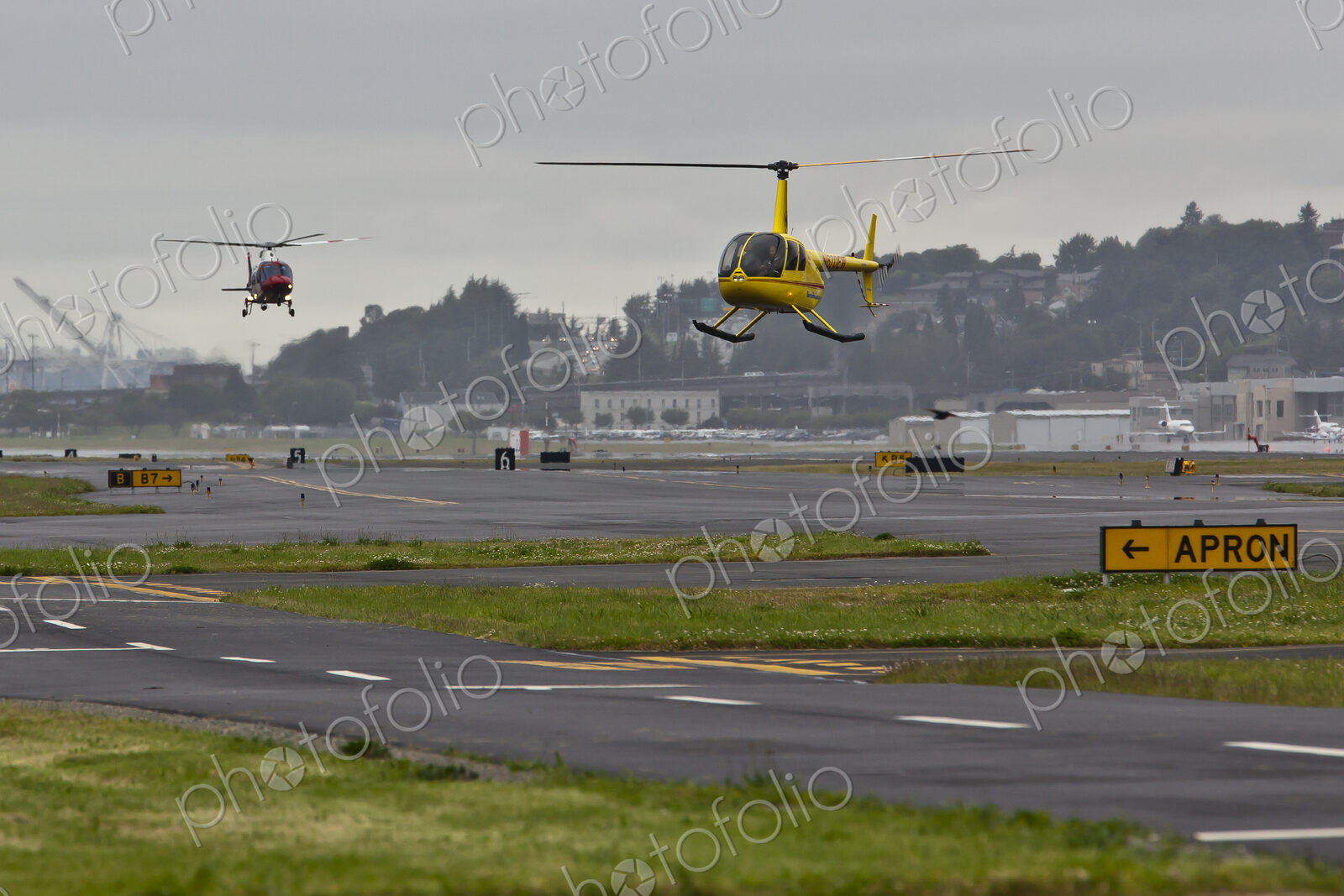 Helicopters Landing on a Runway