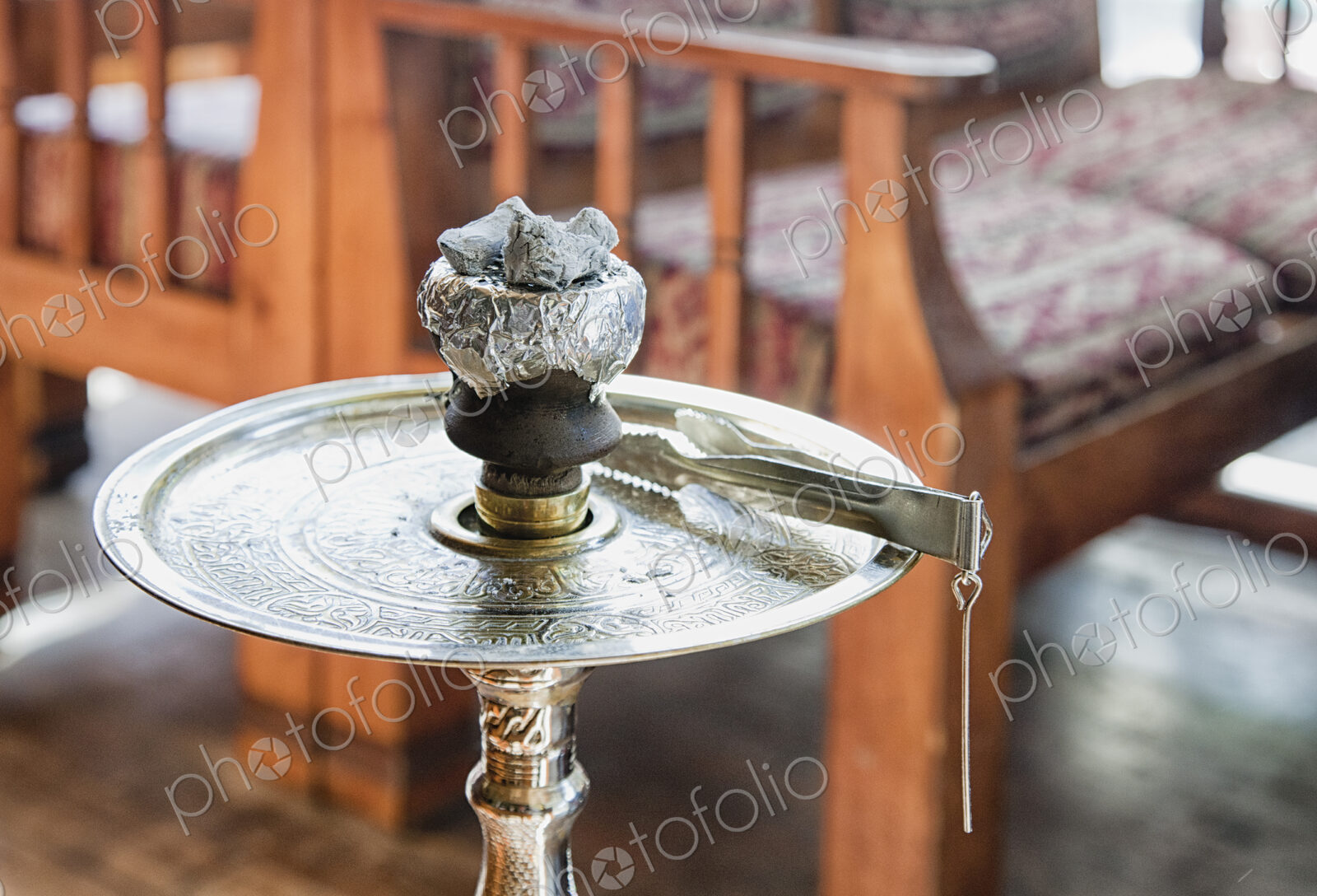 High angle close up of a hookah pipe on a metal table, Turkey.
