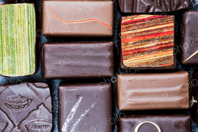 High angle close up of a selection of chocolate pralines.