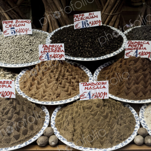 High angle close up of a selection of peppers and spices at an Italian market stall. High angle close up of a selection of peppers and spices at an Italian market stall.