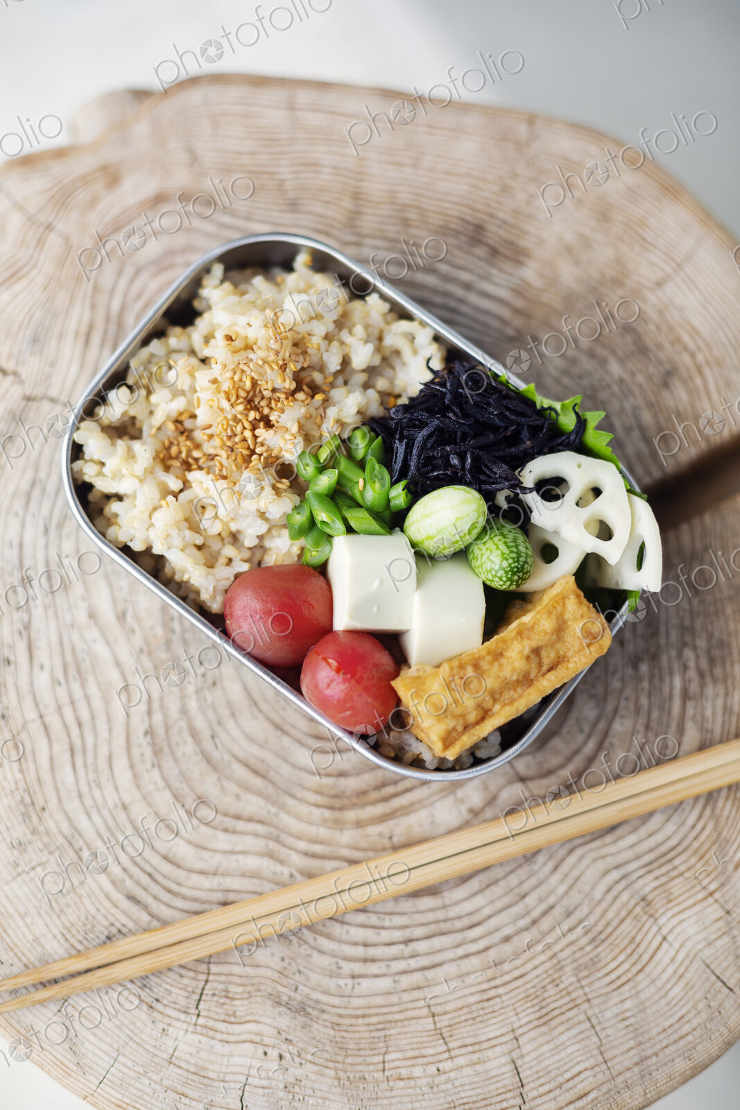 High angle close up of a selection of vegetarian Japanese foods in a cafe.