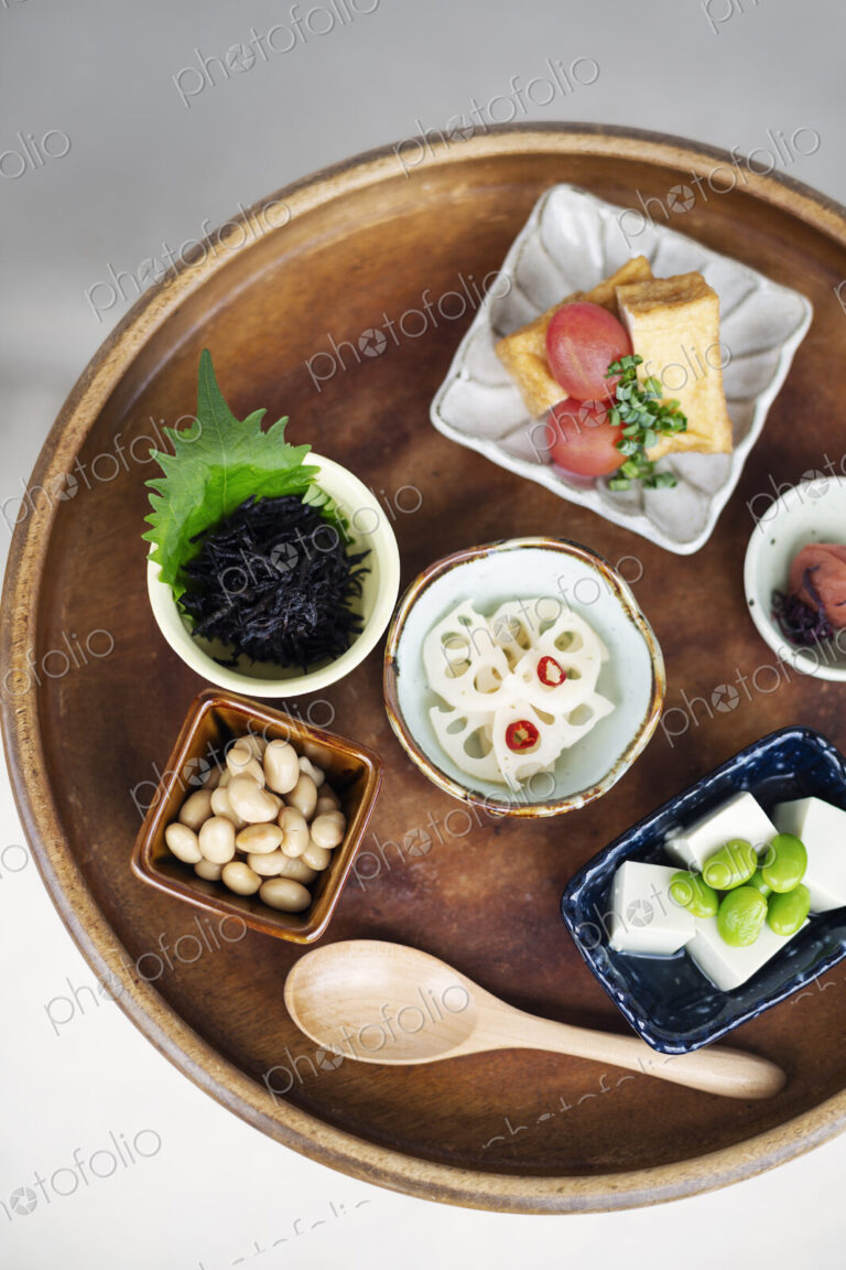 High angle close up of a selection of vegetarian Japanese foods in a cafe.