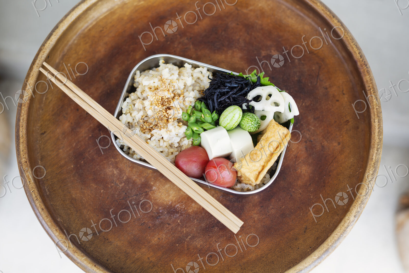 High angle close up of a selection of vegetarian Japanese foods in a cafe.