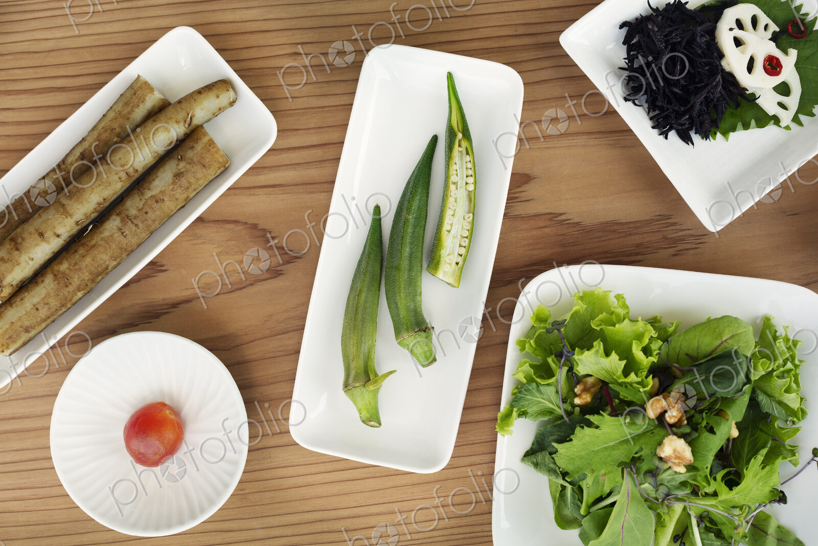 High angle close up of a selection of vegetarian Japanese foods in a cafe.