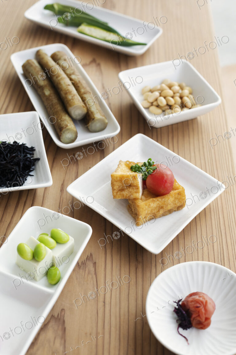 High angle close up of a selection of vegetarian Japanese foods in a cafe.