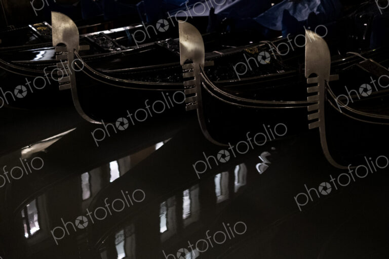 High angle close up of gondolas moored on the Canale Grande in Venice, Veneto, Italy,…