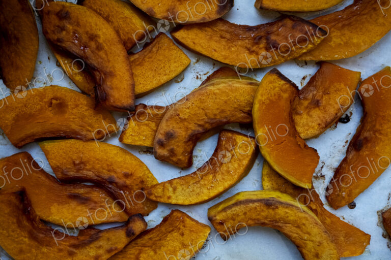 High angle close up of roasted apple slices in an artisan bakery.