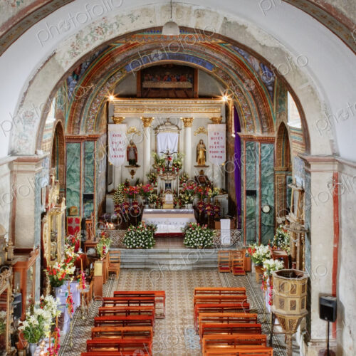 High angle view of an ornate church decorated with flower arrangement. High angle view of an ornate church decorated with flower arrangement.