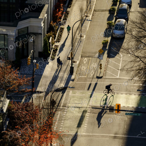 High angle view of bicyclist in city intersection High angle view of bicyclist in city intersection