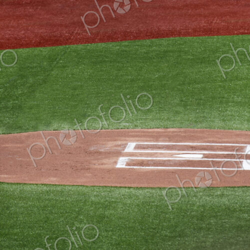 High angle view of home plate of baseball field. High angle view of home plate of baseball field.